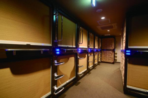 Отель Capsule Hotel Anshin Oyado Shinbashi  Кото